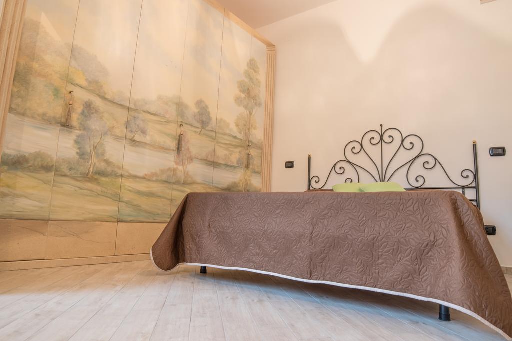 Casa Nina Apartment อาเจโรลา ภายนอก รูปภาพ